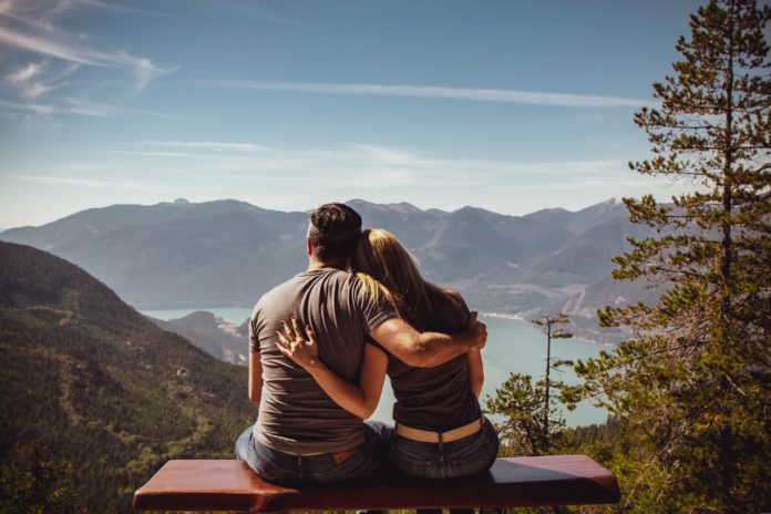 Man and woman hugging each other