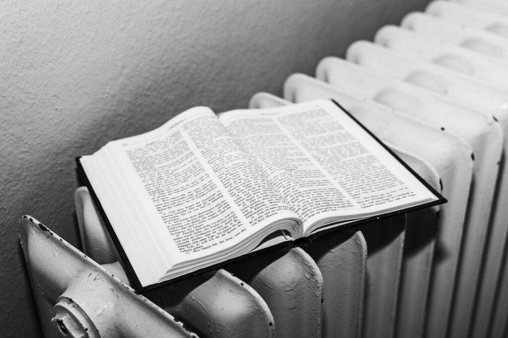 Bible book on radiator