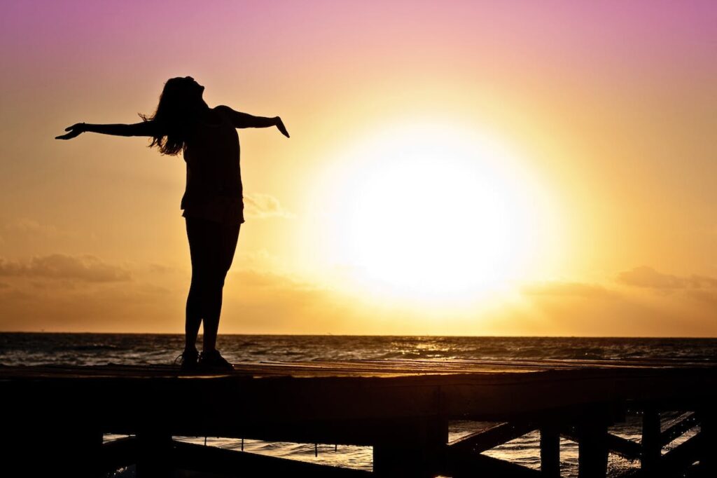 Silhouette Photo of Woman and Sun -photosynthesis