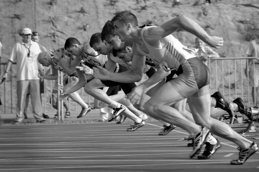 Humans running black and white