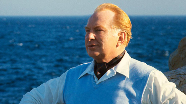 L. Ron Hubbard author in blue shirt